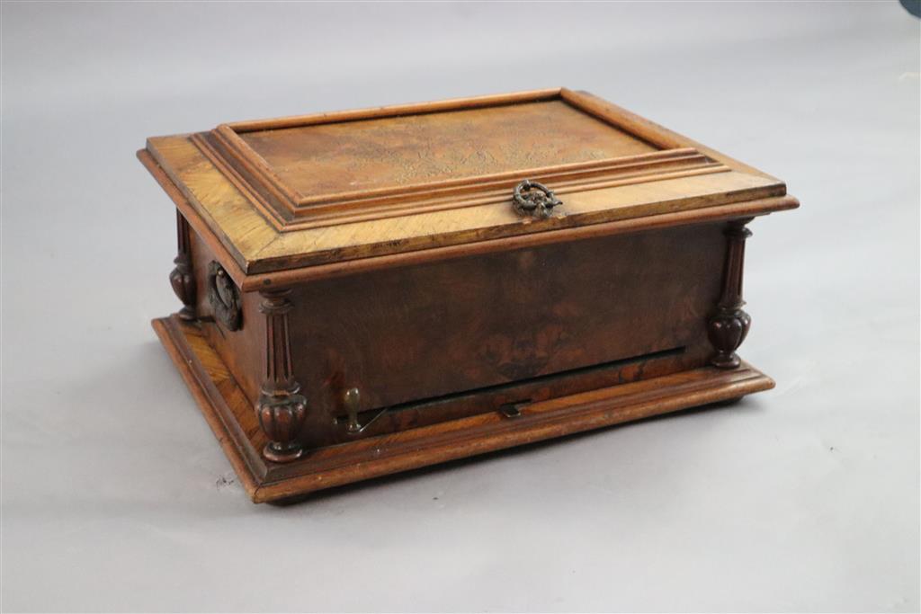 A Victorian German walnut symphonion, width 19.5in. depth 15in. height 9.25in.